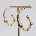 WH Gold Textured 2" Oval Hoop Earring