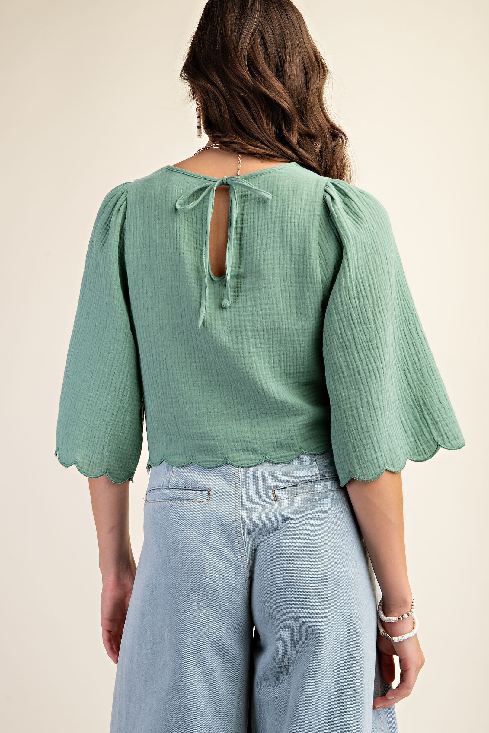 Gigio Embroidered Cutout Bell Sleeve Crop Top